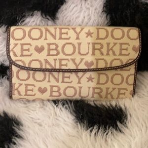 NWOT. Dooney & Bourke wallet.  Cream and blush color.